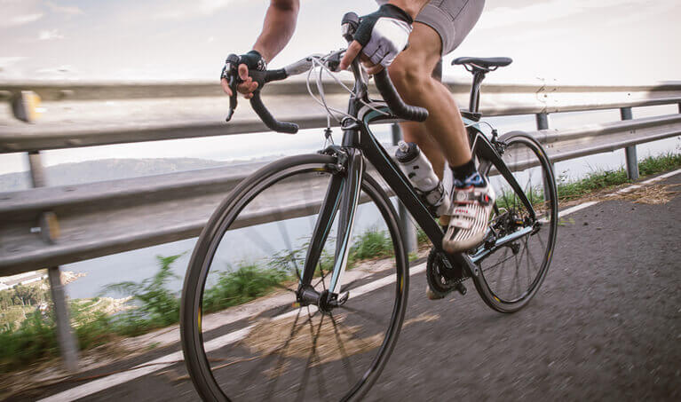 Cyclist riding on the road