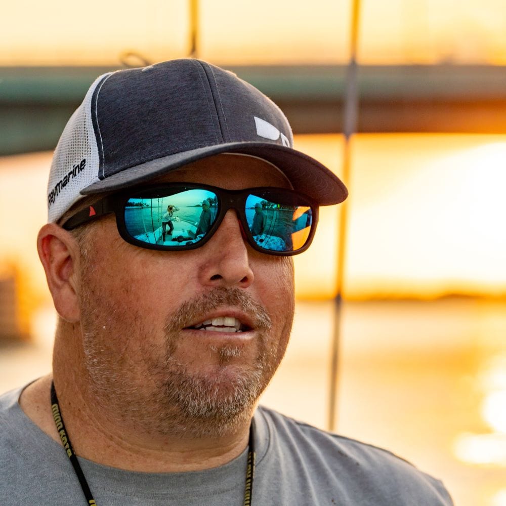 RedFin Jekyll Polarized Fishing Sunglasses on the water at sunset
