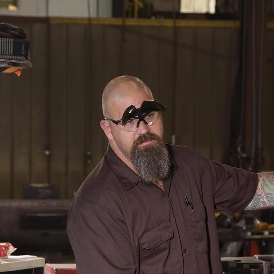 Worker wearing Pyramex Onix Plus Safety Glasses with Clear Anti-Fog Lens and Shade 5 Flip Lens