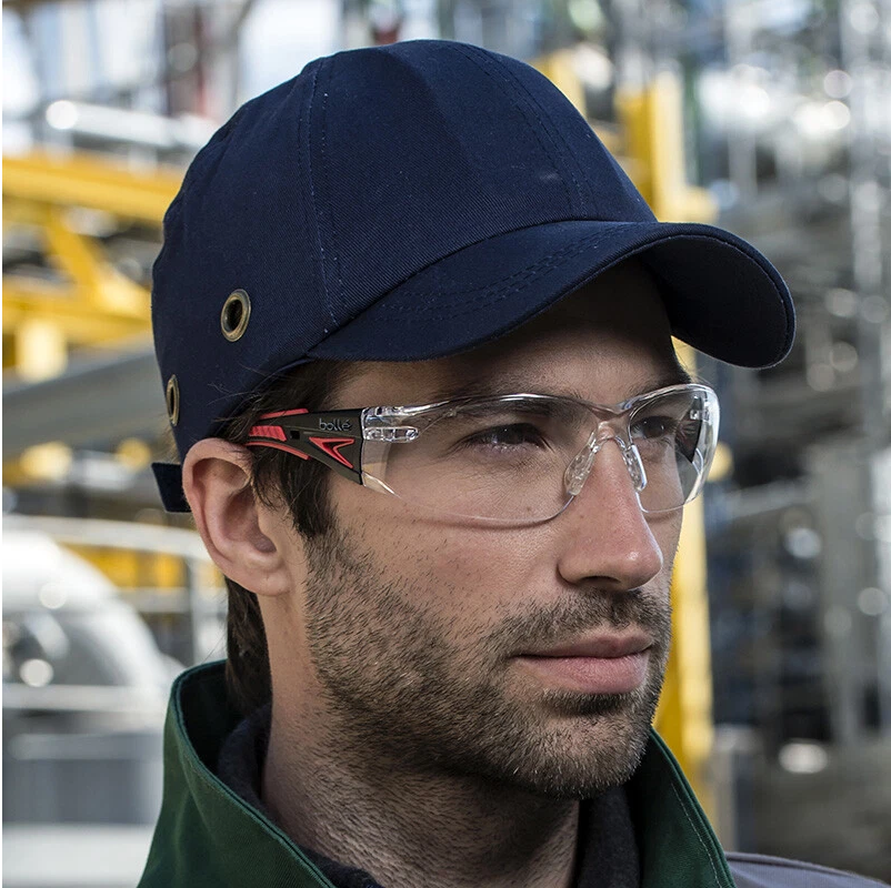 Bolle 41080 Rush Plus Safety Glasses Red-Black with Clear Platinum Anti-Fog Lenses worn by a worker