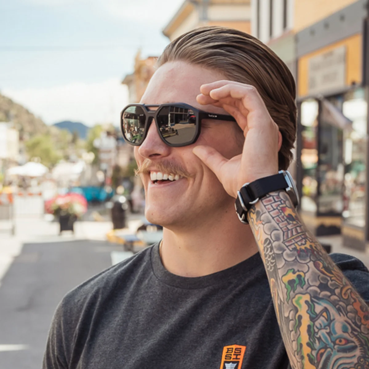 Bolle Altus Safety Glasses Sunglasses Black Frame with Smoke Lenses worn off duty