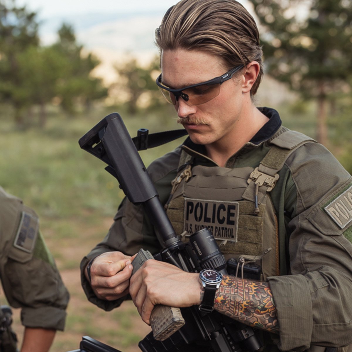 Bolle BSSI Tryon PSSTRYOC13B Ballistic Safety Glasses Black Frame with CSP Platinum Anti-Fog Lenses worn on a mission