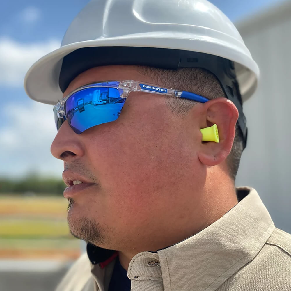 MCR Safety Dominator DM3 Safety Glasses Blue Clear Frame with Blue Mirror Lenses worn by construction worker with a hard hat