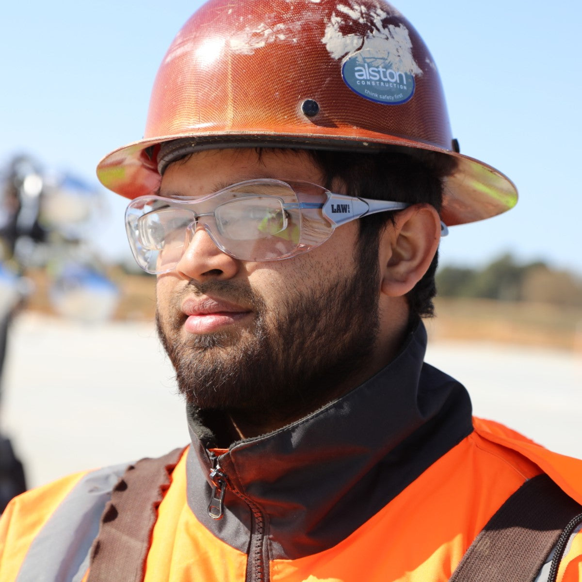 MCR Safety OG110AF Law OTG Safety Glasses worn by a construction worker