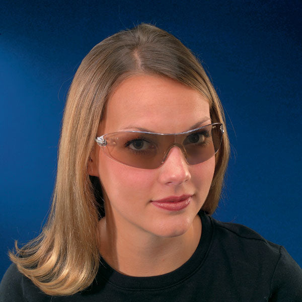 MCR Safety S2219 Small Safety Glasses with Indoor-Outdoor Lens worn by a woman