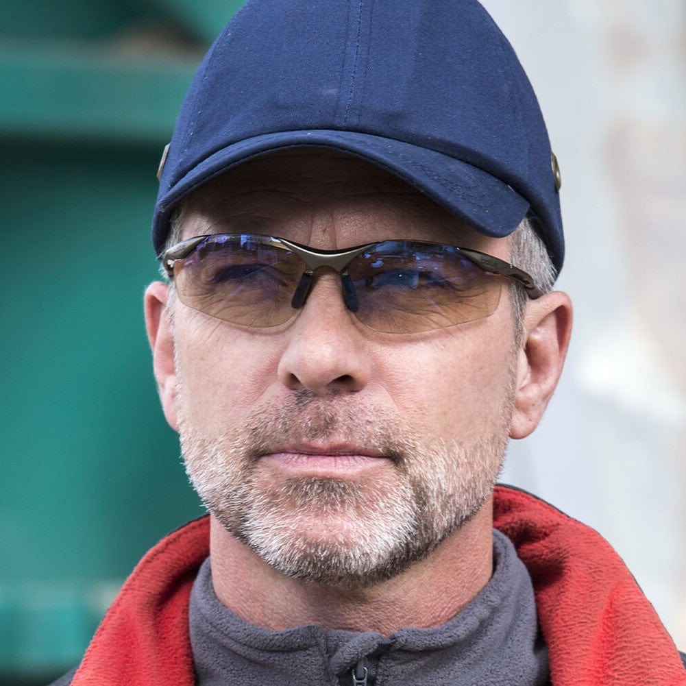 Bolle Contour Safety Glasses with Copper Flash Lens worn by worker