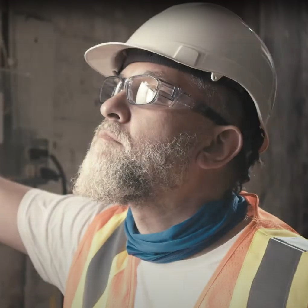 Pyramex Emerge Plus Safety Glasses with Full Reader Lenses worn by a construction worker
