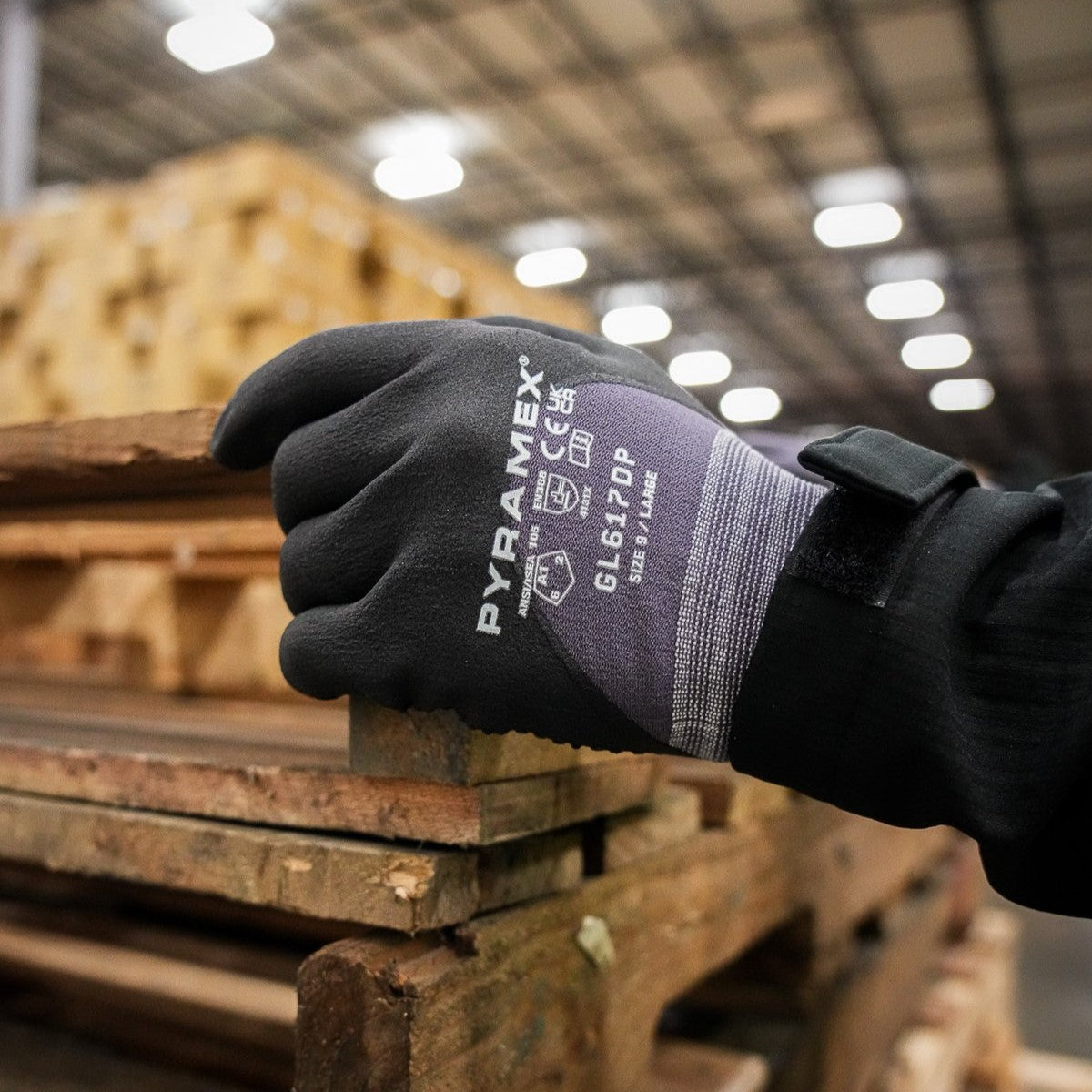 Pyramex GL617 Micro-Foam Nitrile Gloves worn by worker
