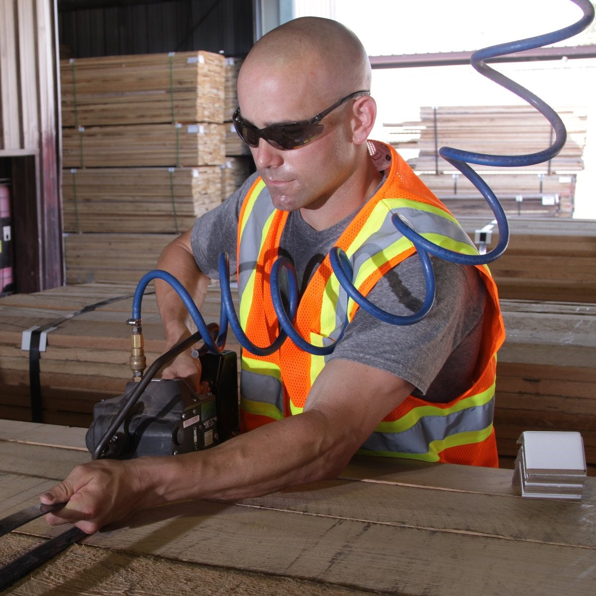 Pyramex Itek Safety Glasses with Gray Lenses worn by worker