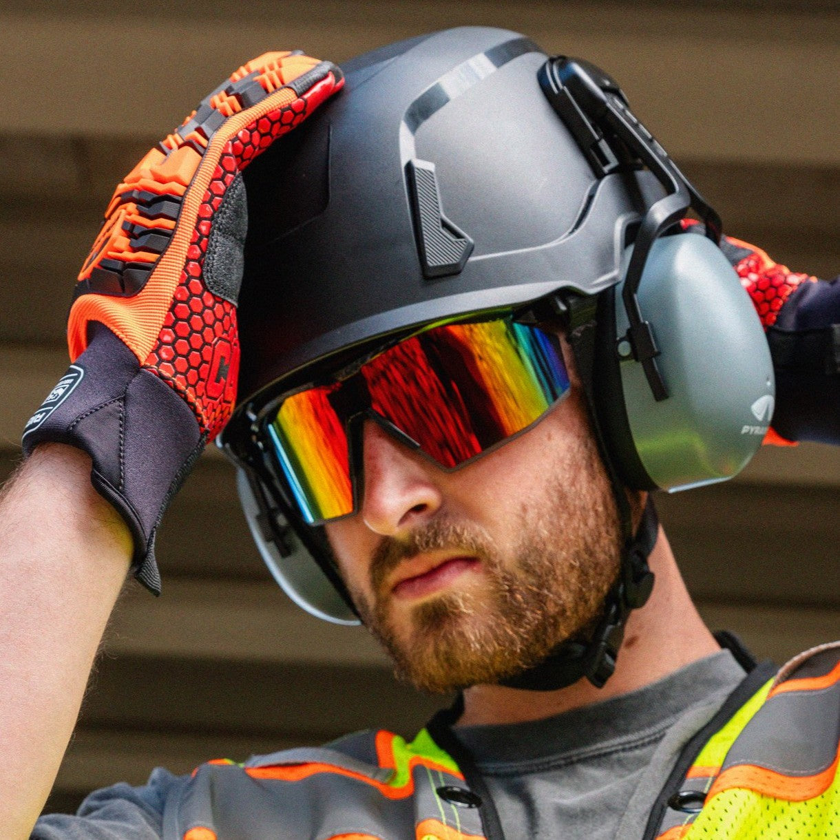 Pyramex PMXSPEC Safety Glasses worn with a hard hat