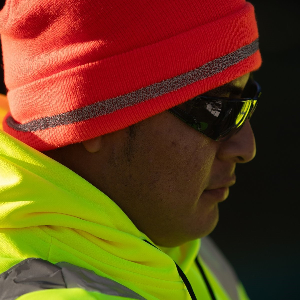 Worker wearing RH120 Hi-Vis Orange Beanie