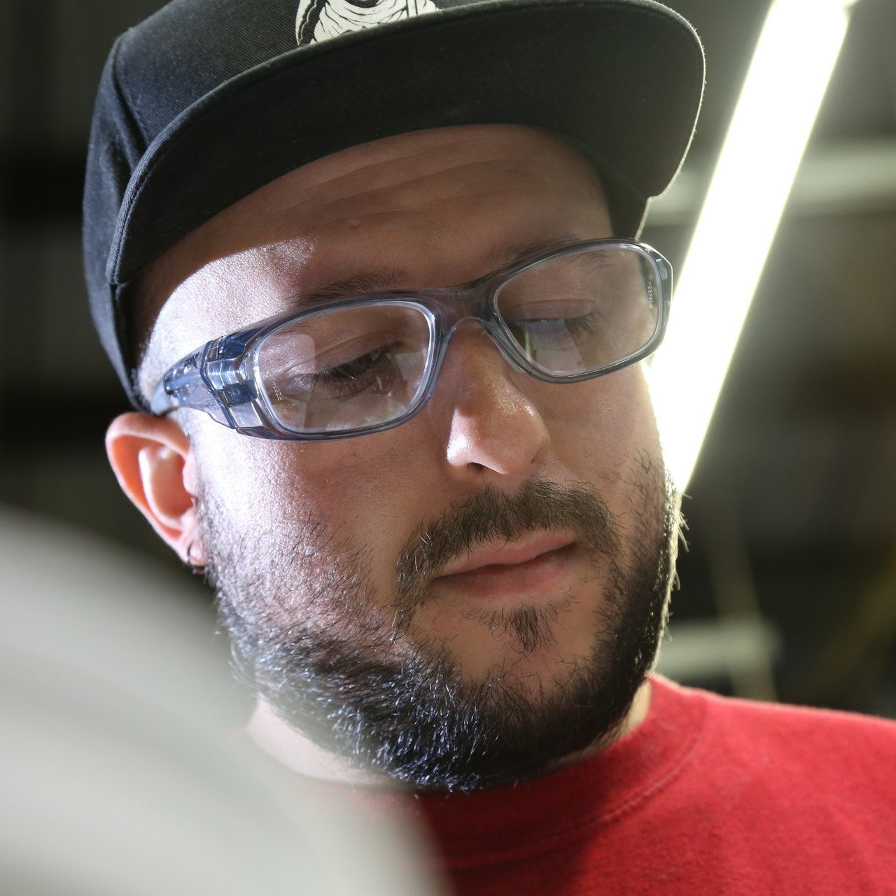 Pyramex SG9810R Emerge Plus Safety Glasses with Clear Full Lens Magnification worn by a worker