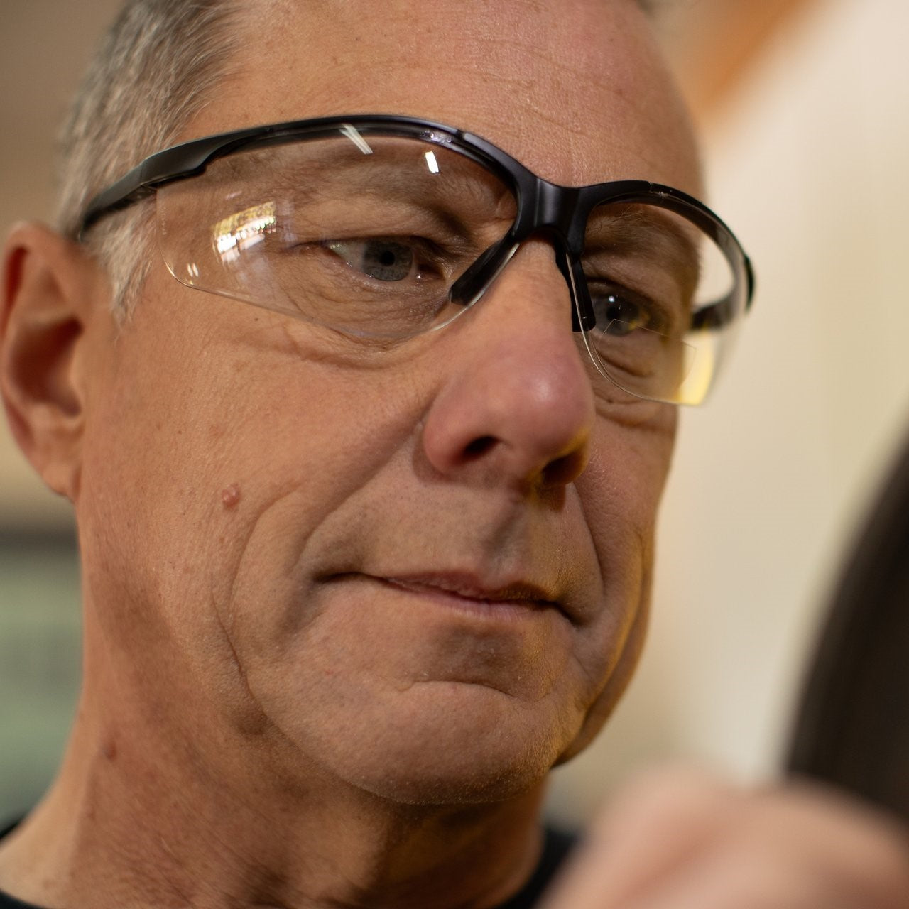 Pyramex V2 Reader Bifocal Safety Glasses SB1810R10 with Clear Lenses worn by worker