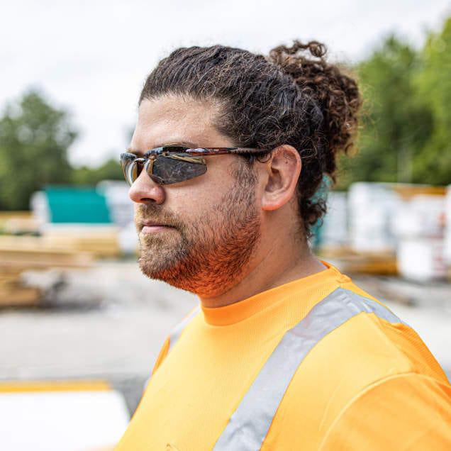 Crossfire ES5 Safety Glasses with Crystal Brown Frame and HD Brown Flash Mirror Lens worn on the job