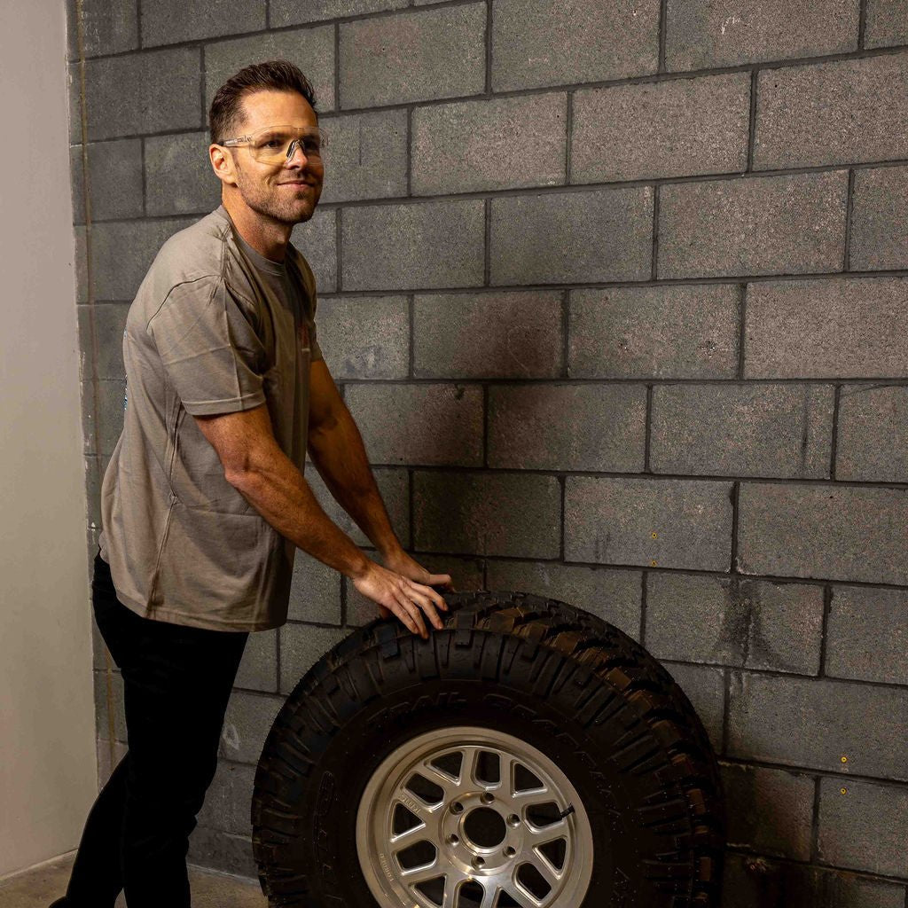 CO Eyewear General Z87+ Safety Glasses with Photochromic Lens worn by autoworker