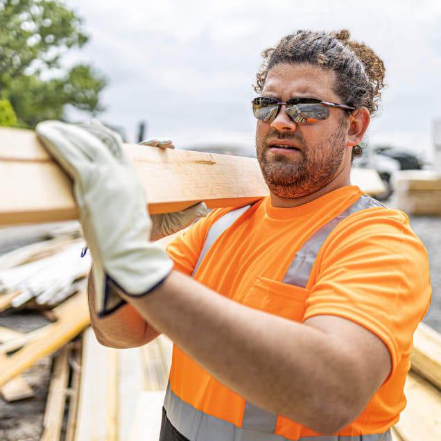 Crossfire ES5 Safety Glasses with Crystal Brown Frame and HD Brown Flash Mirror Lens worn in the field