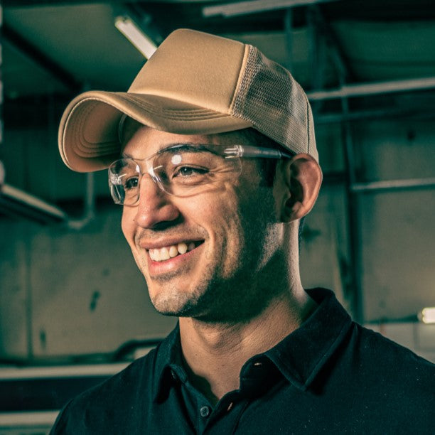 Worker wearing MCR Safety BK110AF Safety Glasses