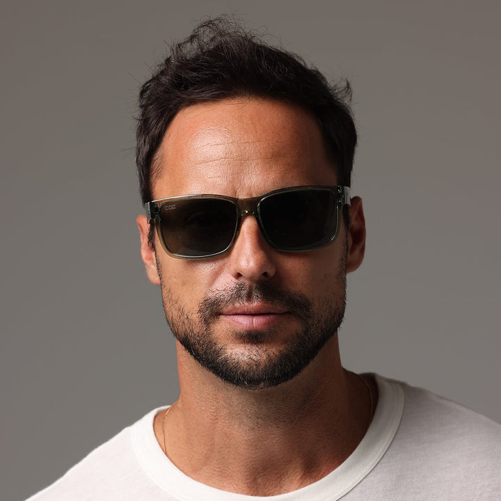 CO Eyewear Oiler Z87+ Safety Glasses with Gray Frame and Smoke Lenses worn by model