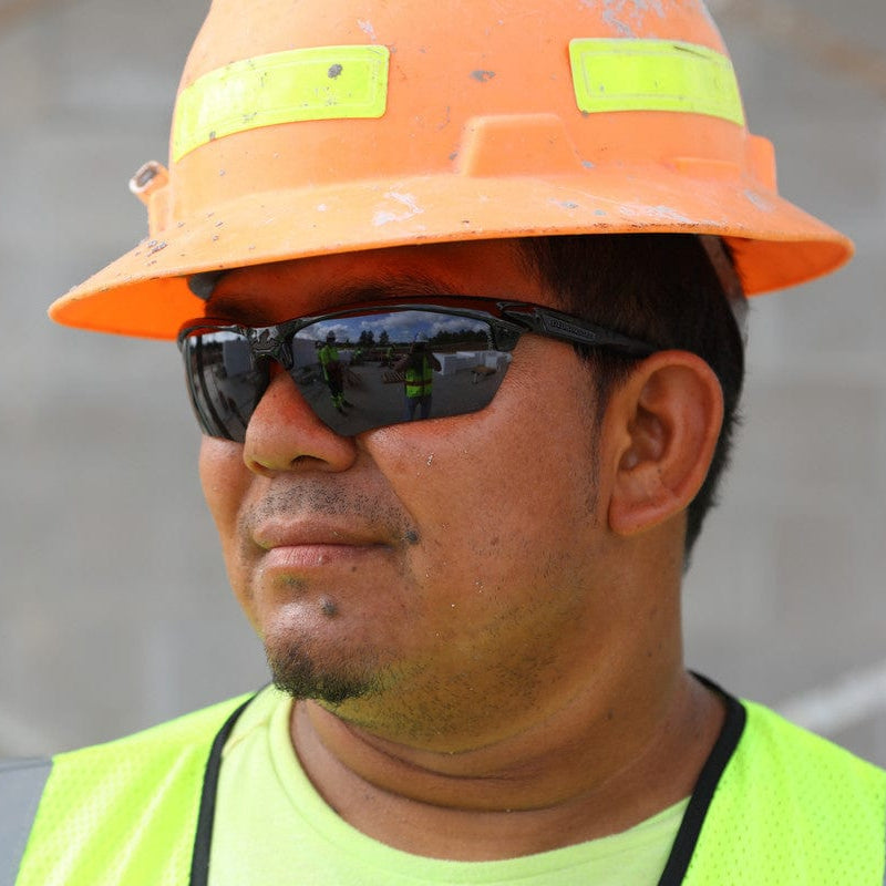 MCR Safety Dominator DM3 Safety Glasses DM1332PF Black Frame with Gray Anti-Fog Lenses worn with a hard hat