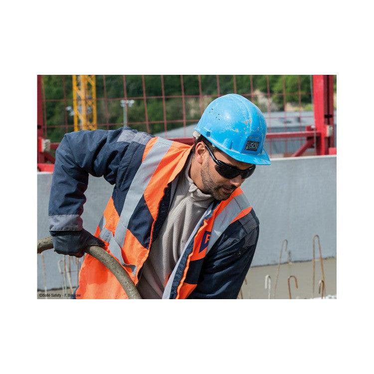 Bolle IRI-s Safety Glasses with Black Temples and Smoke Anti-Fog Lens - Man Working Wearing IRI-s