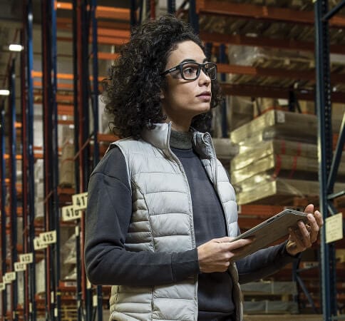 Woman Wearing Bolle Kick Safety Glasses with Side Shields and Clear Blue-Blocker Lens PXFKICK109