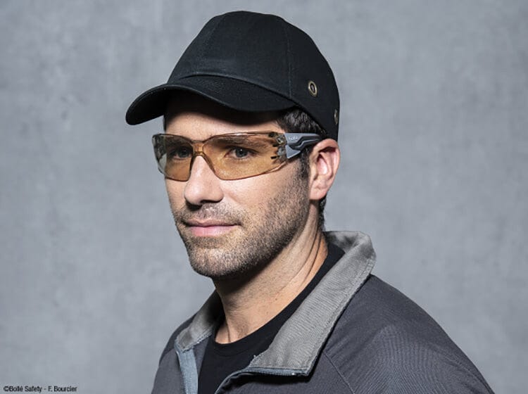 Man Wearing Bolle Silex Plus Safety Glasses with Gray/Black Temples and CSP Platinum Anti-Fog Lens
