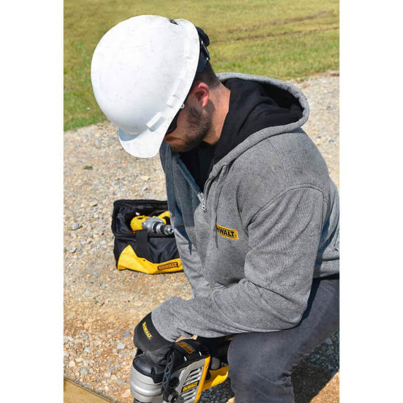 DEWALT DCHJ080B Unisex Heated French Terry Cotton Hoodie Heather Gray Without Battery - Man Working with Jacket On