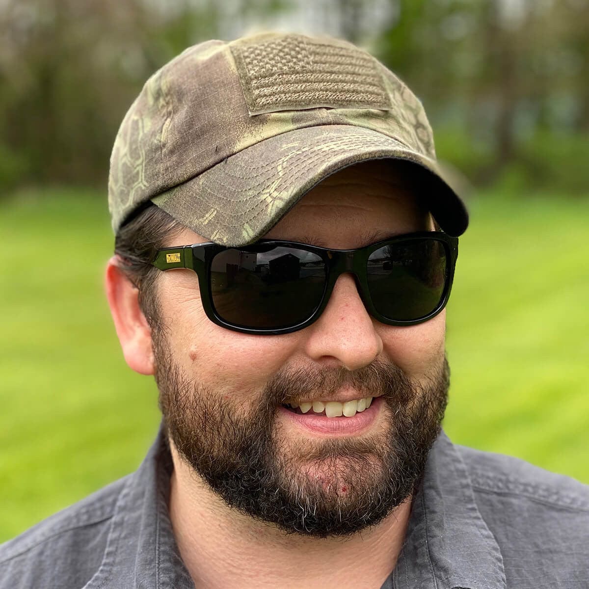 DeWalt Supervisor Safety Glasses with Black Frame and Smoke Lens - Being Worn