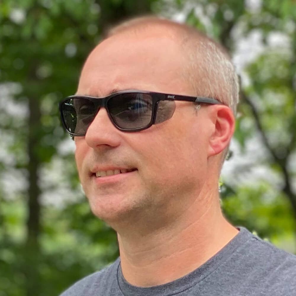 Pyramex Conaire Safety Glasses with Black Frame and Gray Lens SB10720D - Being Worn