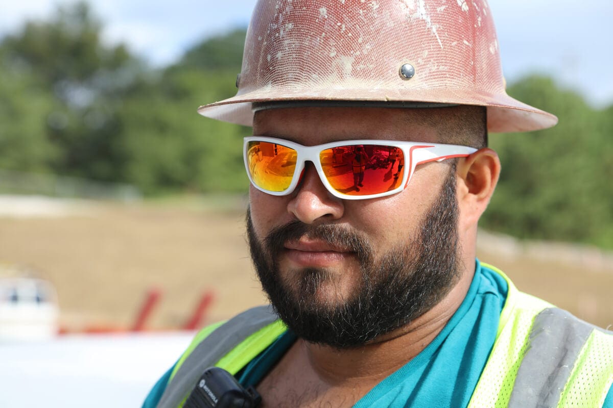 Crews Swagger SR4 Safety Glasses with White Frame and Fire Mirror Lens - Lifestyle Image 1