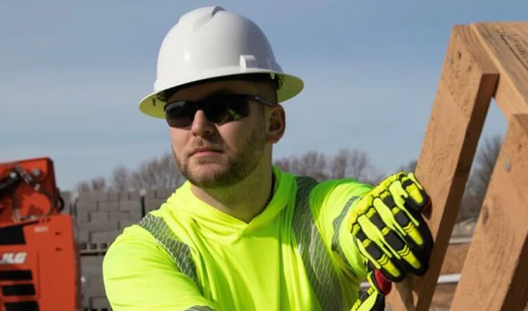 A construction worker wearing safety equipment