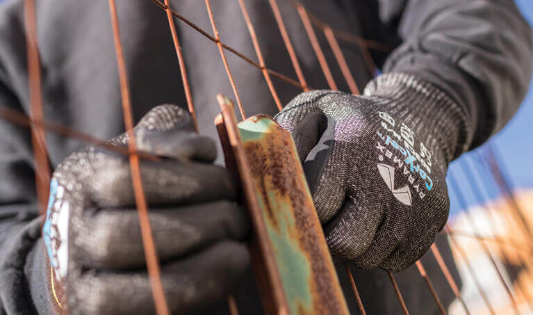 Farmer wearing Pyramex work gloves