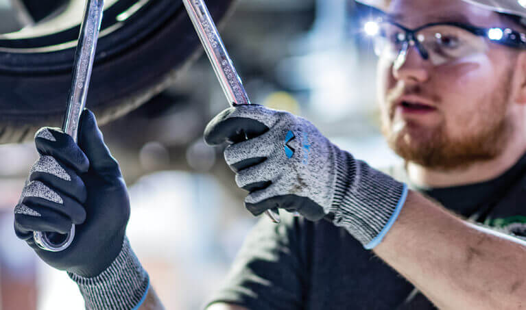 Auto Mechanic wearing Pyramex work gloves