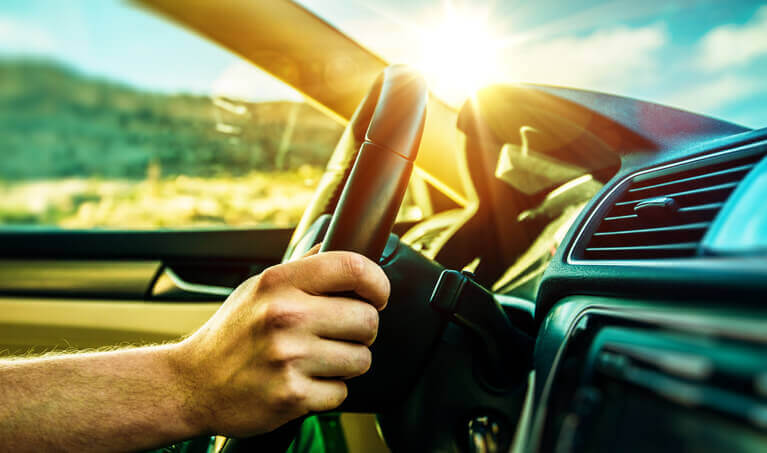 Bright sunlight entering a cars windshield