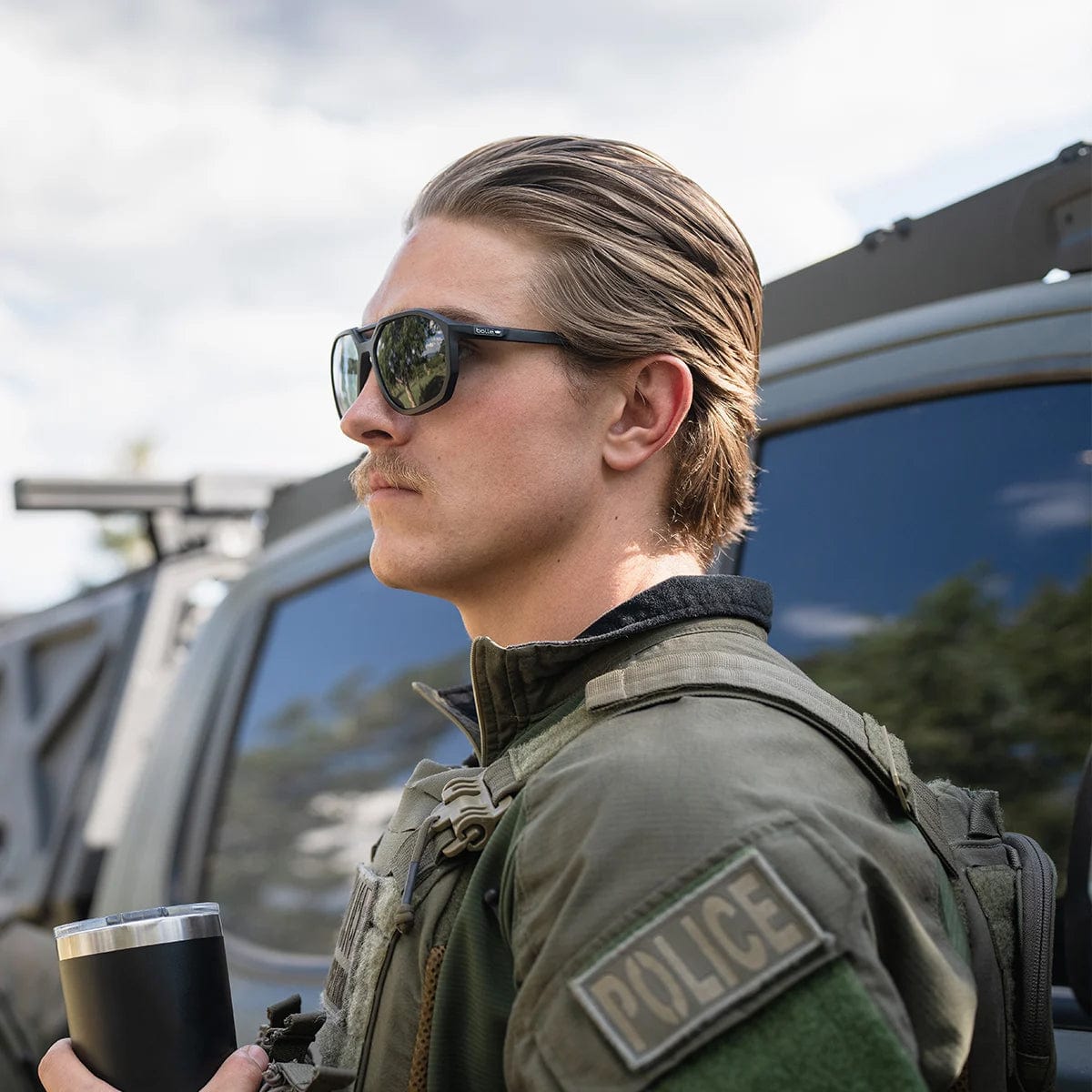 Bolle Altus Sunglasses worn on duty drinking coffee