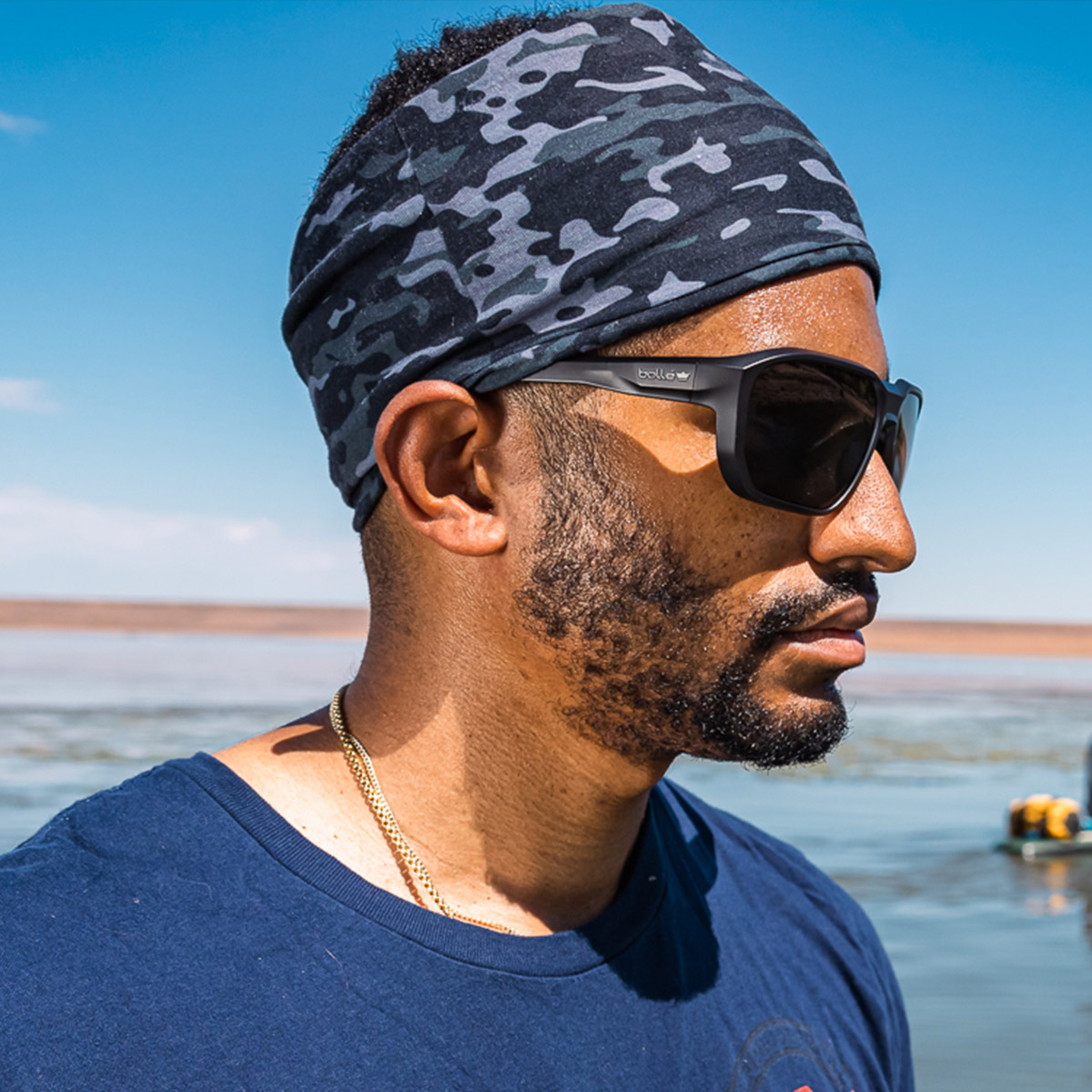 Bolle KNOXXT20M Knox Safety Glasses Black Frame with Smoke Anti-Fog Lenses worn on the water