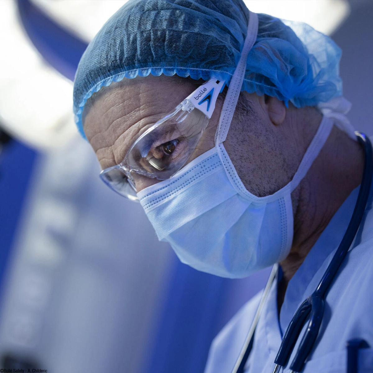 Bolle Rush Plus Safety Glasses White/Blue with Clear Platinum Anti-Fog Lens worn by medical staff