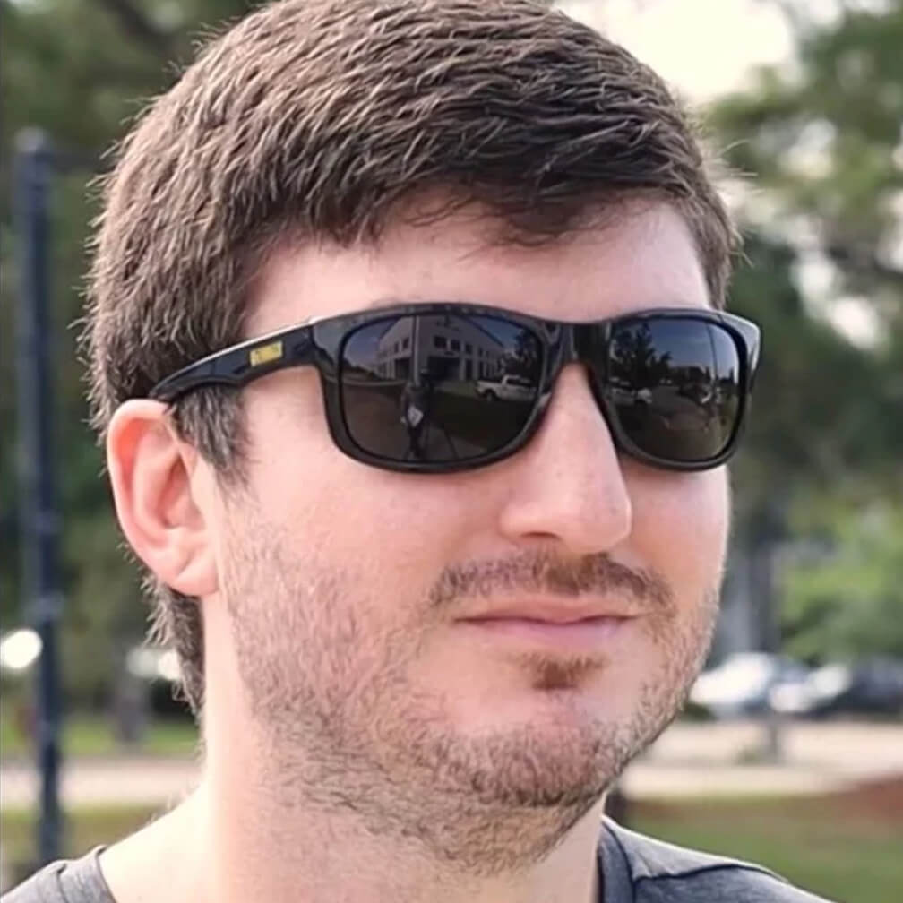 DEWALT DPG107-2D Supervisor Safety Glasses - Black Frame - Smoke Lens worn outdoors