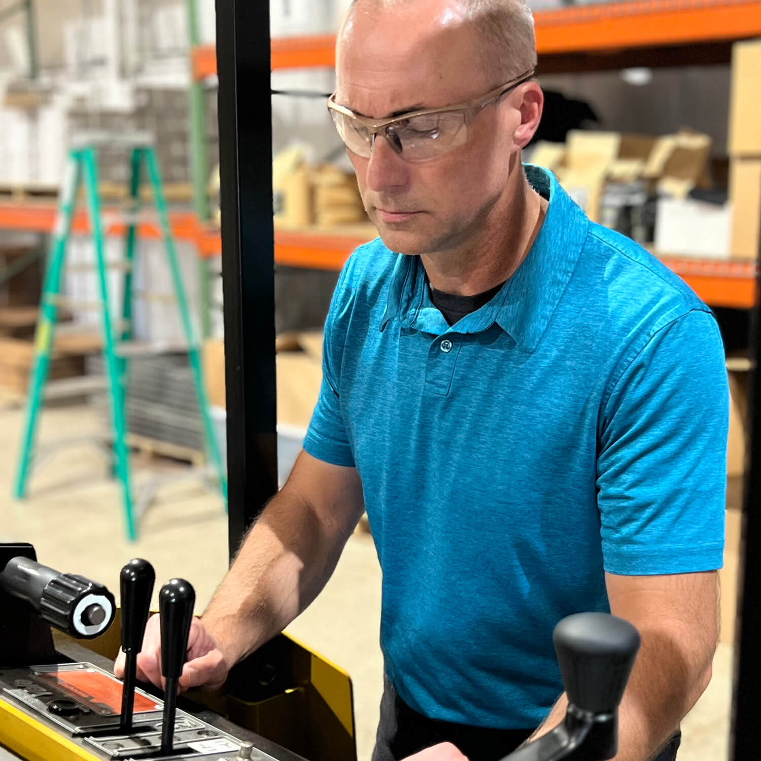 Delta Plus Sonoma RX-350 Bifocal Safety Glasses with Clear Lens worn by worker on forklift