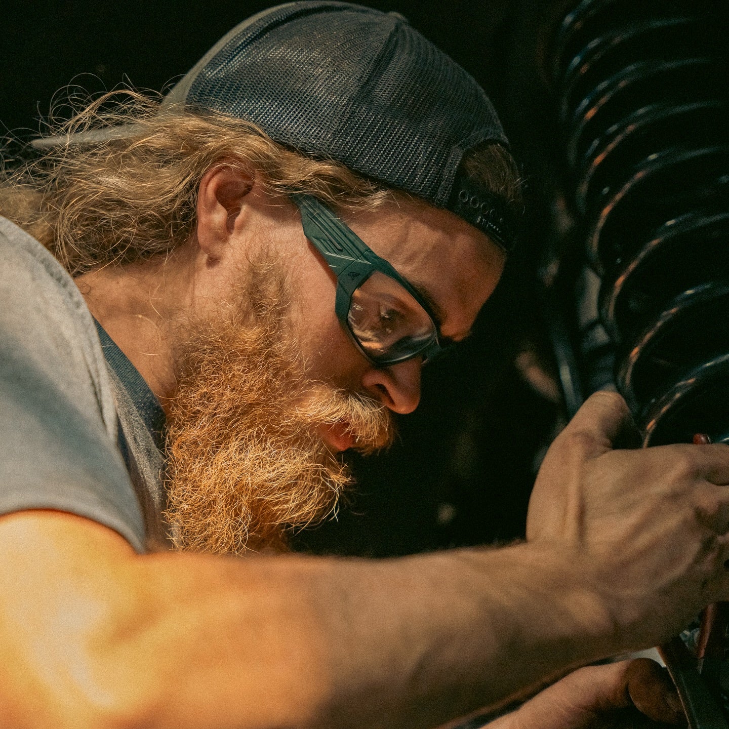 Mechanic wearing Edge Dawson Safety Glasses with Black Frame and Clear Anti-Fog Lenses