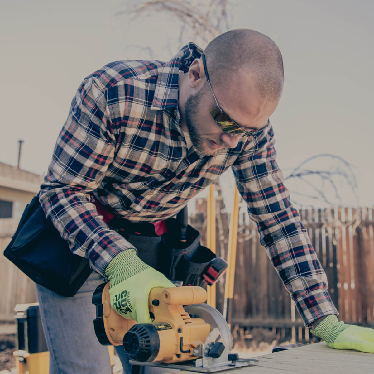 MCR Safety Rubicon T4 Safety Glasses worn by worker using a saw