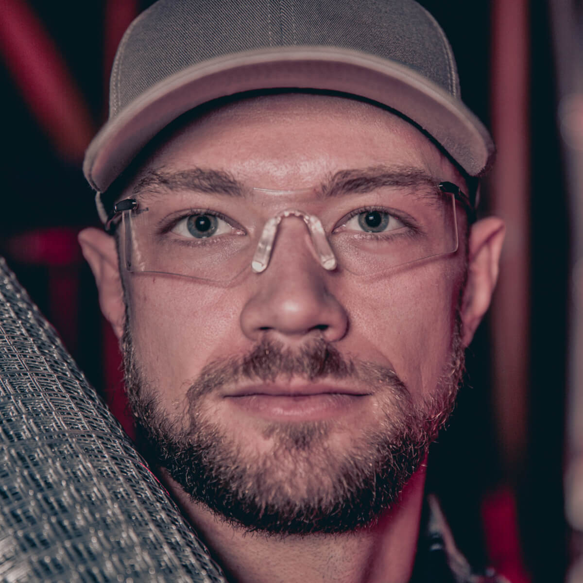 MCR Safety T4110AF Rubicon T4 Safety Glasses with Clear Anti-Fog Lens worn by worker front view