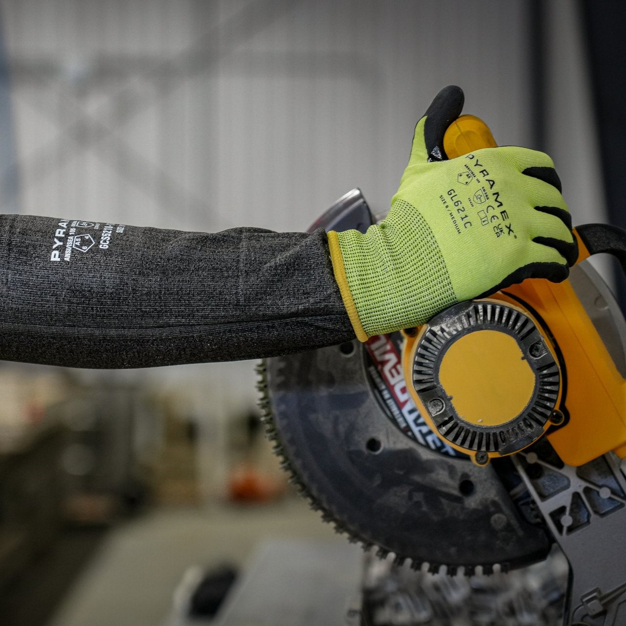 Pyramex GL621C A5 Cut-Resistant Micro-Foam Nitrile Gloves worn while operating a table saw