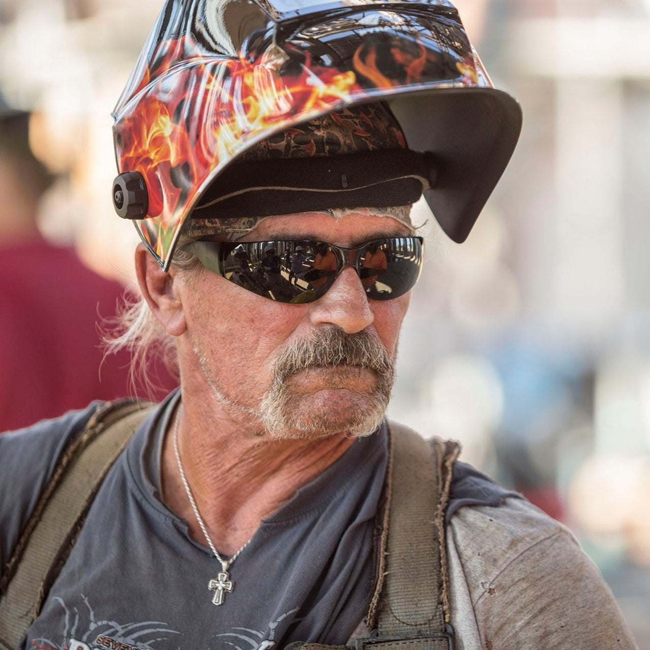 Welder wearing Pyramex Intruder Safety Glasses with Gray Lenses and WHAM3030FL Welding Helmet