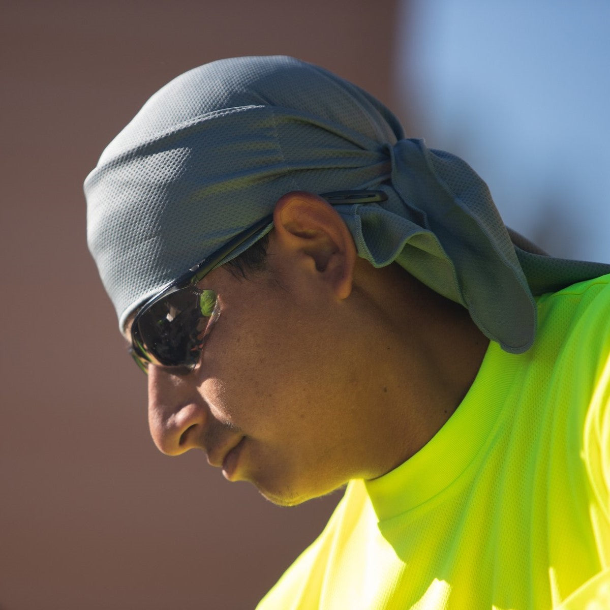Pyramex Neshoba Safety Glasses with Gray Lenses worn by worker