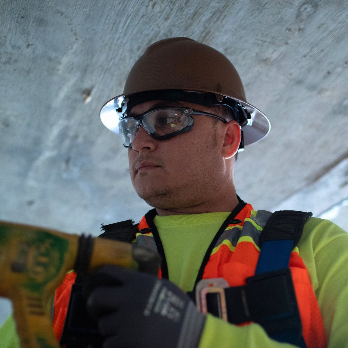 Pyramex Proximity Foam-Lined Safety Glasses with Clear Lenses worn by construction worker with a hard hat
