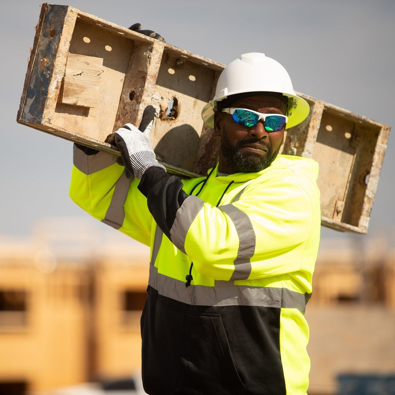 Pyramex RSSH3210 safety sweatshirt. Made from 100% polyester fleece, it features a convenient hand warmer pocket and a black bottom front designed to hide dirt.