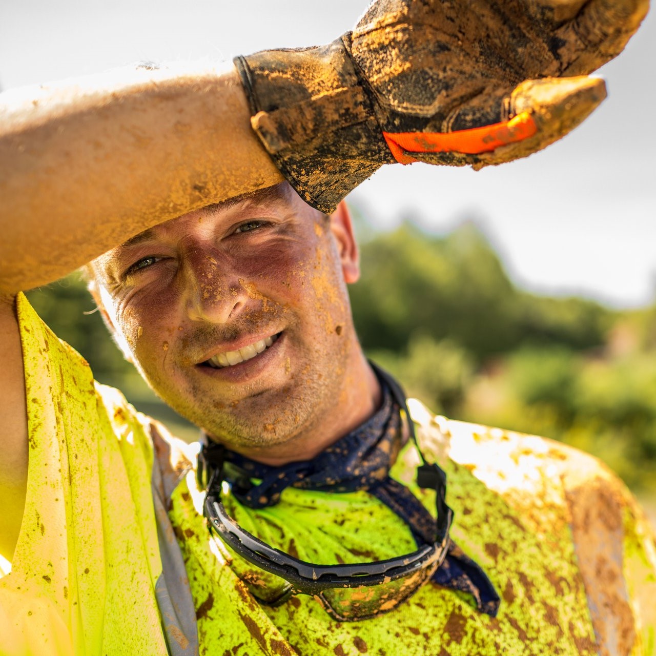 Pyramex RTS2110 Hi-Vis Lime Safety T-Shirt covered in mud