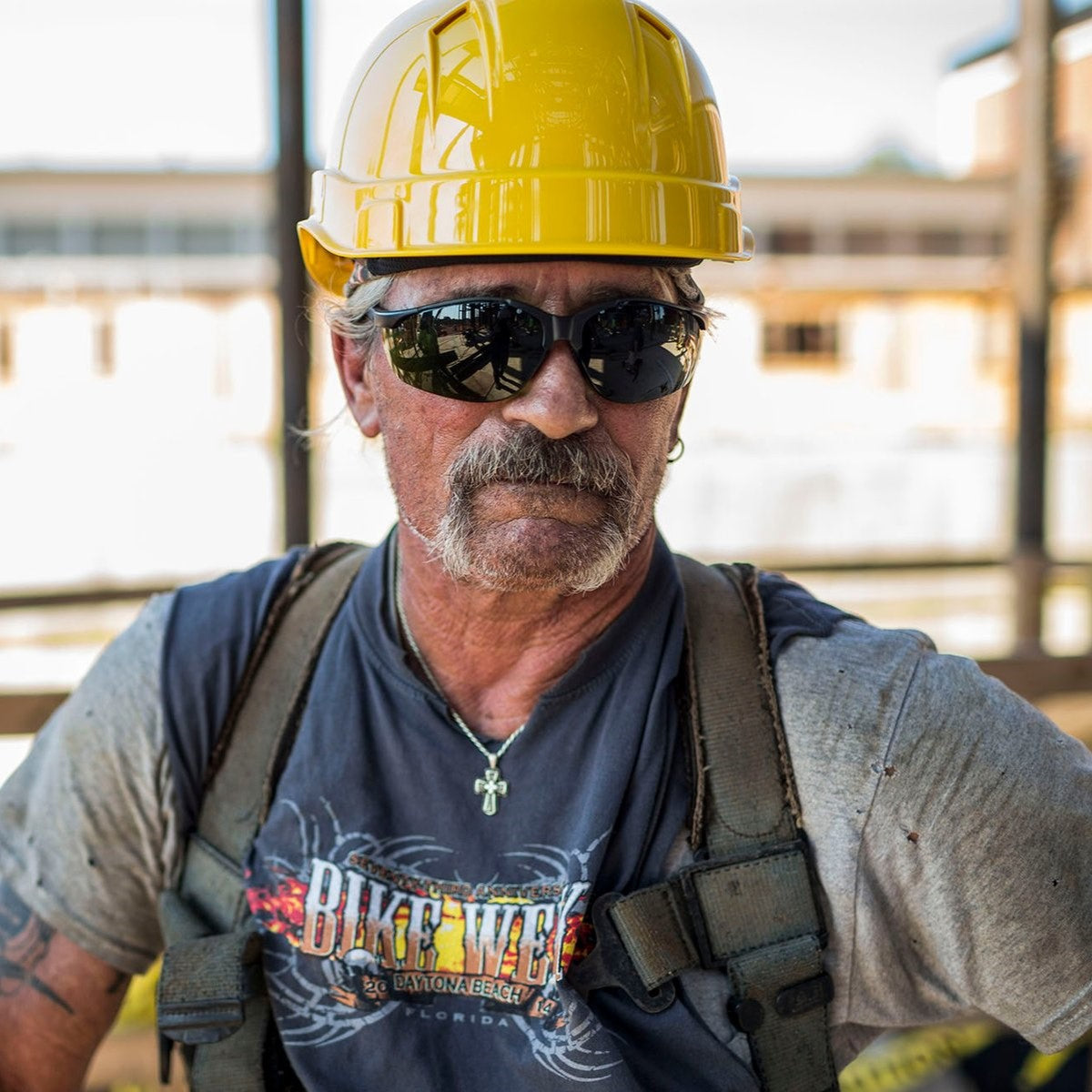 Pyramex SB1850SF Venture II Safety Glasses - Black Frame - 5.0 IR Filter Lens worn by worker with hard hat