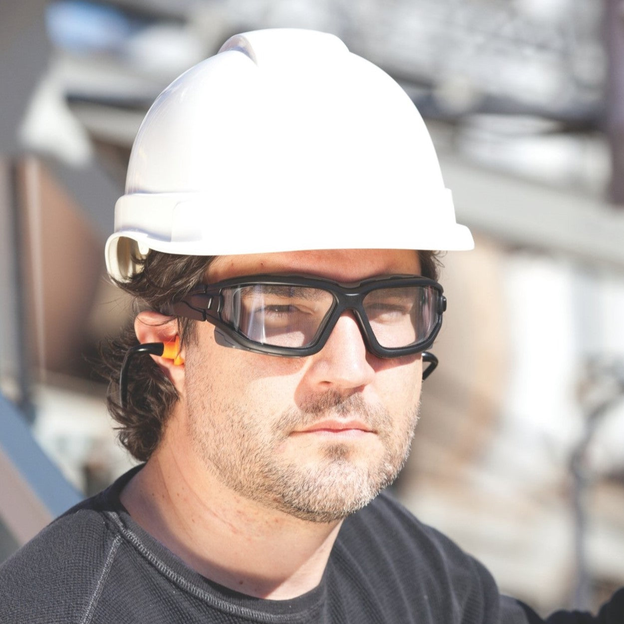 Pyramex SB7010SDT I-Force Safety Goggle/Glasses Black Frame Clear Anti-Fog Lenses worn by worker with a hard hat